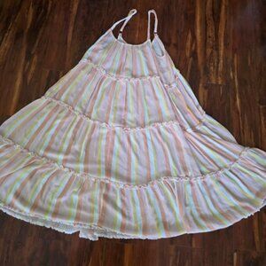 a sleeveless striped summer dress